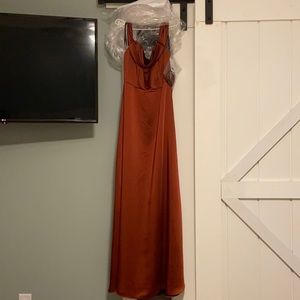 Dessy bridesmaid dress in charmeuse lux. Color is auburn moon